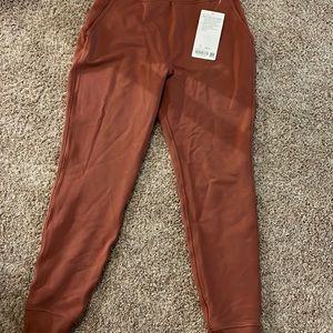 Lululemon Warm Down HR Jogger with the tag still on, never worn.